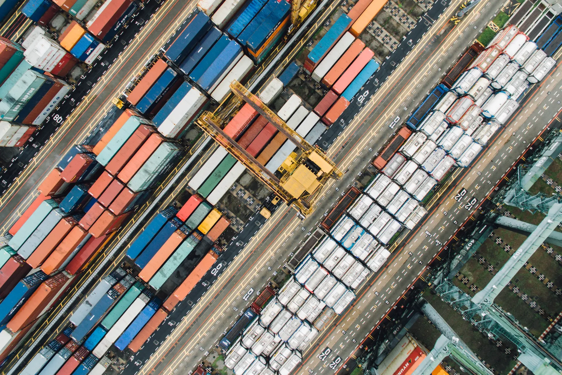 Aerial view of operating logistics infrastructure and shipping containers